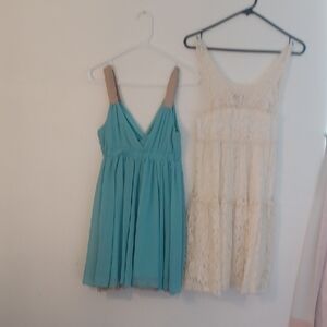 2 pretty summery dresses. One turquoise, One off-white